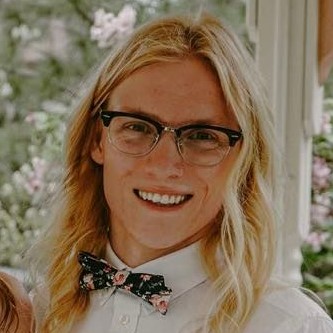 Kyle McKell holding a plant